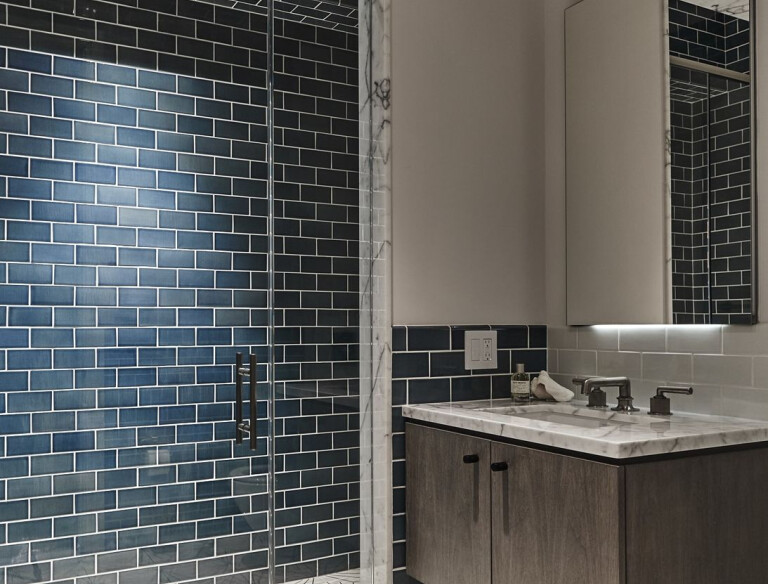 Waterworks Henry fixtures, Restoration Hardware Bistro Globe Sconce, and Marrakesh SE Dandelion tile